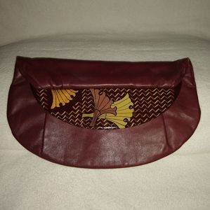 Zushi hand painted leather clutch.